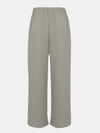 Back view of Full Size Tassel Wide Leg Pants, emphasizing the flowy silhouette and relaxed fit.