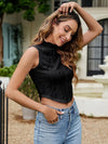 Model styled in the Textured Mock Neck Tank with high-waisted jeans for a chic casual look.