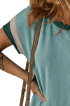 Front view of the Textured Round Neck Short Sleeve Dress in light blue, featuring a round neckline and short sleeves.