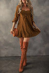 Woman styled in the Textured Square Neck Mini Dress with knee-high boots and boho accessories, perfect for fall outings.