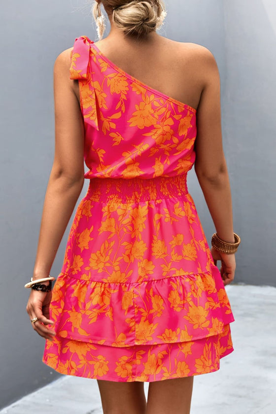 Back view of the Tied Smocked Printed Single Shoulder Dress highlighting the vibrant floral print.