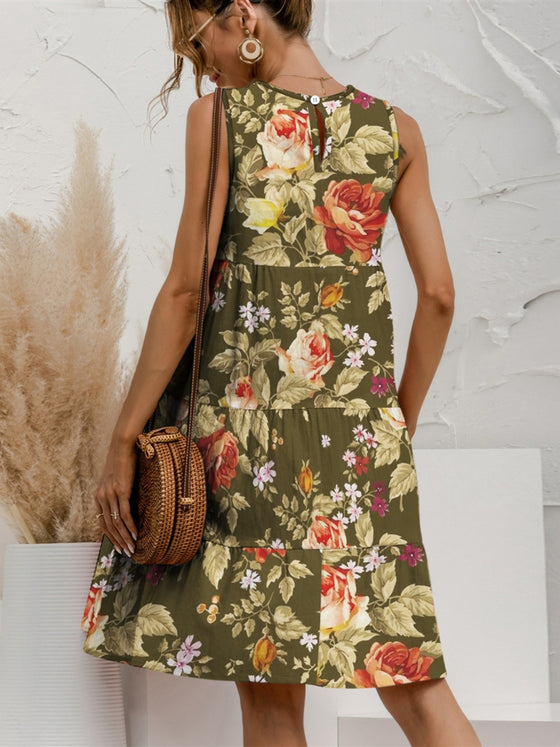 Back view of the Tiered Printed Round Neck Sleeveless Dress, showcasing its floral print and tiered design