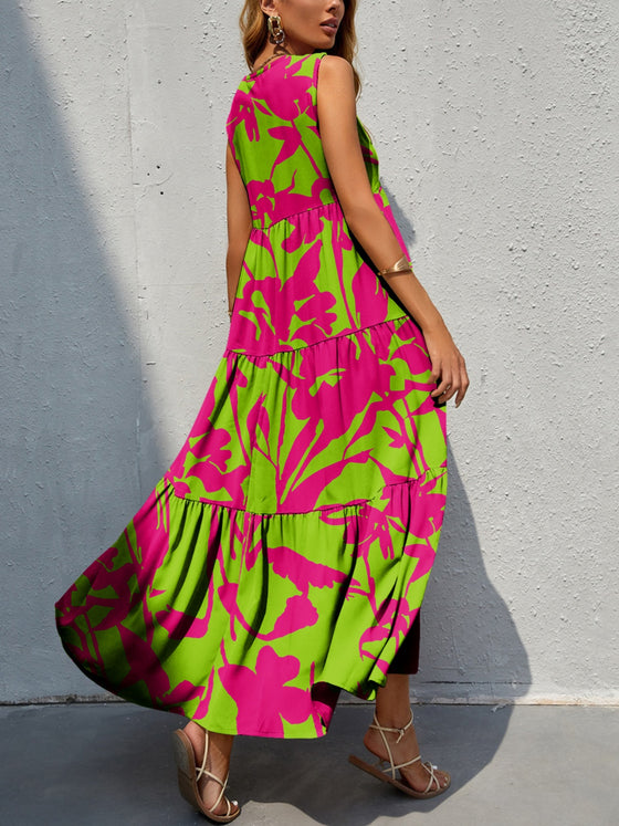 Back view of the Tiered Printed V-Neck Sleeveless Dress with colorful prints and a flowing tiered design.