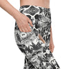 Close-up of tiger print high waisted leggings with pockets. Compression leggings for women with secure side pocket and tapered legs for gym or yoga.