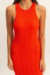 Close-up front view of the tomato ribbed bodycon dress highlighting soft knit texture and neckline design—stylish, breathable, and curve-accentuating fashion.
