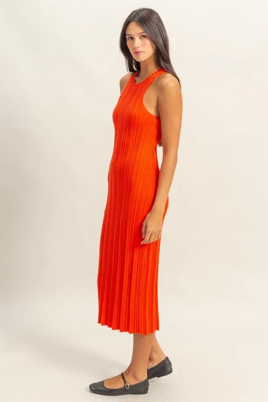 Side view of a slim-fit tomato ribbed bodycon dress showing curve-enhancing stretch fabric—perfect for stylish nights out, dinner parties, or vacations.