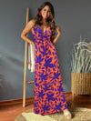 Front view of the Twisted Printed V-Neck Cami Dress with bold floral print and twisted neckline.