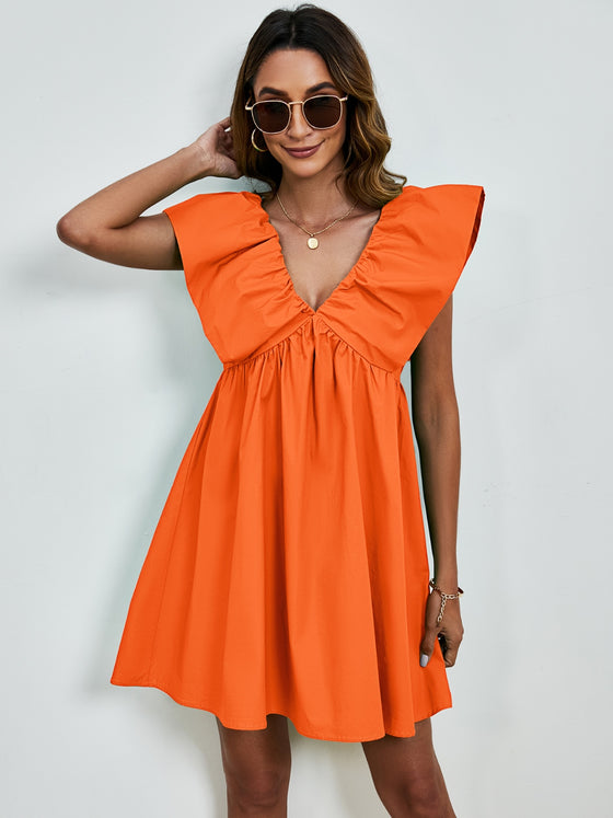 Front view of the orange V-Neck Cap Sleeve Mini Dress showcasing its flowy fit and cap sleeves.