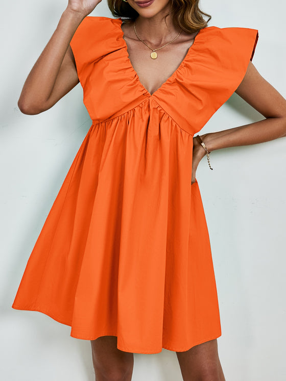 Front view of the orange V-Neck Cap Sleeve Mini Dress showcasing its flowy fit and cap sleeves.