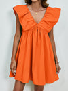 Woman wearing an orange V-Neck Cap Sleeve Mini Dress with a flowy A-line silhouette and charming cap sleeves, perfect for casual and dressy events.

