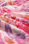 Another detailed fabric shot highlighting the intricate floral prints, breathable weave, and vibrant colors that define the dress.

