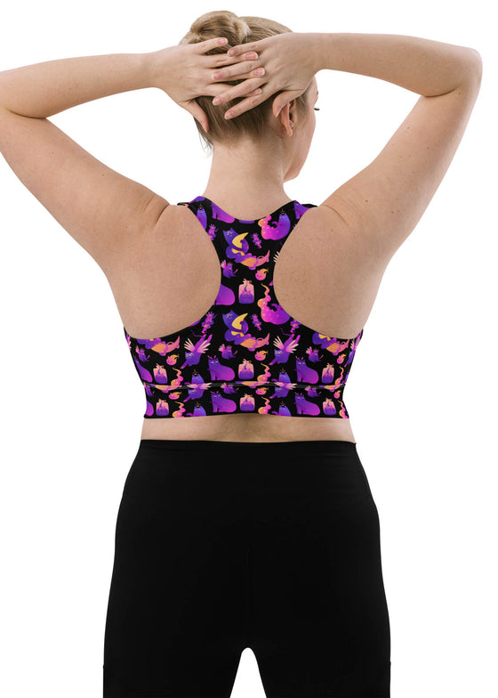 Large-size back view of the Witchy Kitties Black Racerback Sports Bra. Designed with a secure racerback fit, breathable mesh lining, and compression support for high-impact activities.