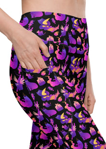  Close-up of Witchy Kitties Printed Black high-waist leggings with pockets. Featuring playful cat designs and mystical elements, ideal for yoga, workouts, or casual wear.