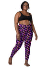 Plus-size woman wearing Witchy Kitties Printed Black high-waist leggings with pockets. Comfortable and flattering fit with a mystical cat and moon print, perfect for every body type.