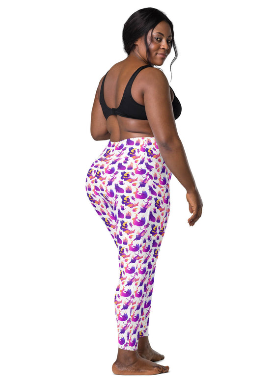 Back view of plus-size woman in Witchy Kitties Printed White high-waist leggings with pockets. Fun, functional, and comfortable leggings for everyday wear and workouts.
