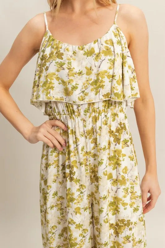 Feminine and relaxed front look of the printed wide leg jumpsuit, capturing its soft fabric, vibrant pattern, and effortless one-piece styling.