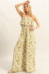 Front view of the yellow-green printed wide leg jumpsuit showcasing its breezy silhouette, flattering neckline, and comfortable fit for summer days.