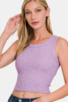 Woman wearing a lilac Zenana Ribbed Cropped Tank styled with denim jeans, showcasing the ribbed texture and trendy cropped fit.

