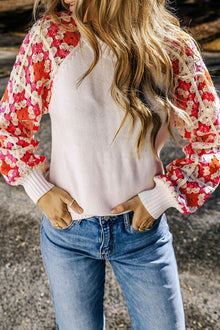  Front view of the Flower Element Openwork Round Neck Sweater, featuring colorful crochet-style floral sleeves in pink, red, and white.