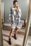 Printed Button Up Mini Dress styled with accessories, displaying a complete outfit look.