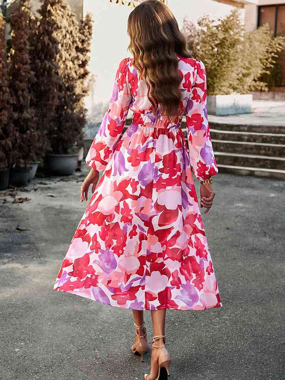 Back view of the Printed V-Neck Long Sleeve Midi Dress in Strawberry color.