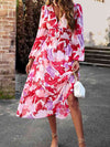 Front view of the Printed V-Neck Long Sleeve Midi Dress in Strawberry color.