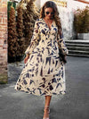 Printed V-Neck Long Sleeve Midi Dress styled with accessories for an outfit idea.